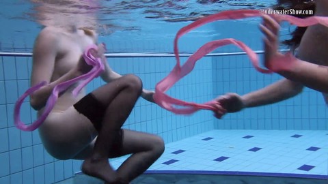 Andrejka and Aneta enjoy a steamy nude swim in the pool